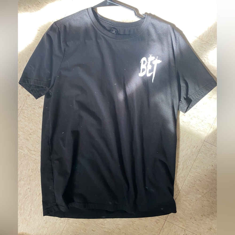 black shirt, size m, good condition. sorry I don't have an iron
